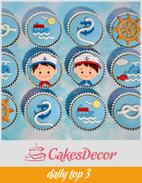Nautical cupcakes for two little twins .