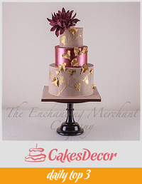 Suede, shimmering marsala and antiqued gold wedding cake