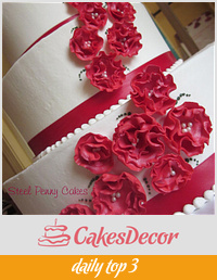 Red ruffle flower wedding cake