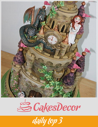castle cake with added dragon, knight and princess