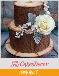 @ Tiered Wood Effect cake with Edible flowers & Leaves for Cuban