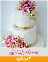 Gold and pink wedding cake