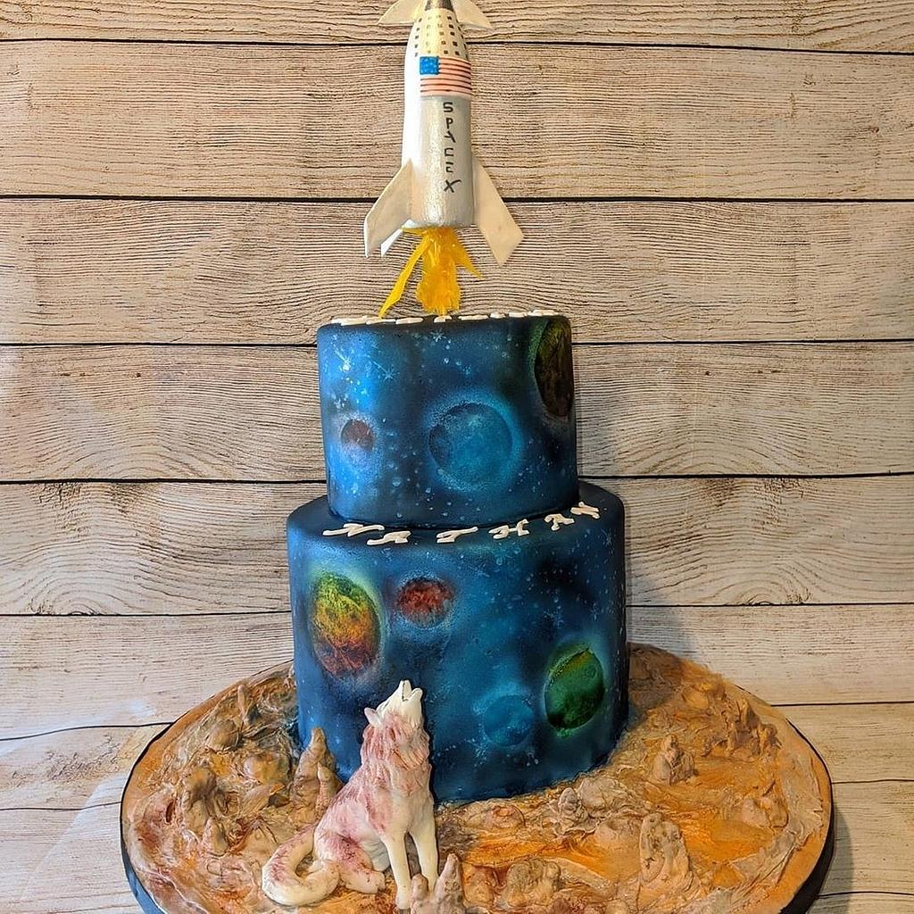 I baked an astronaut cake for my new neighbor, a refugee from Ukraine :  r/Baking