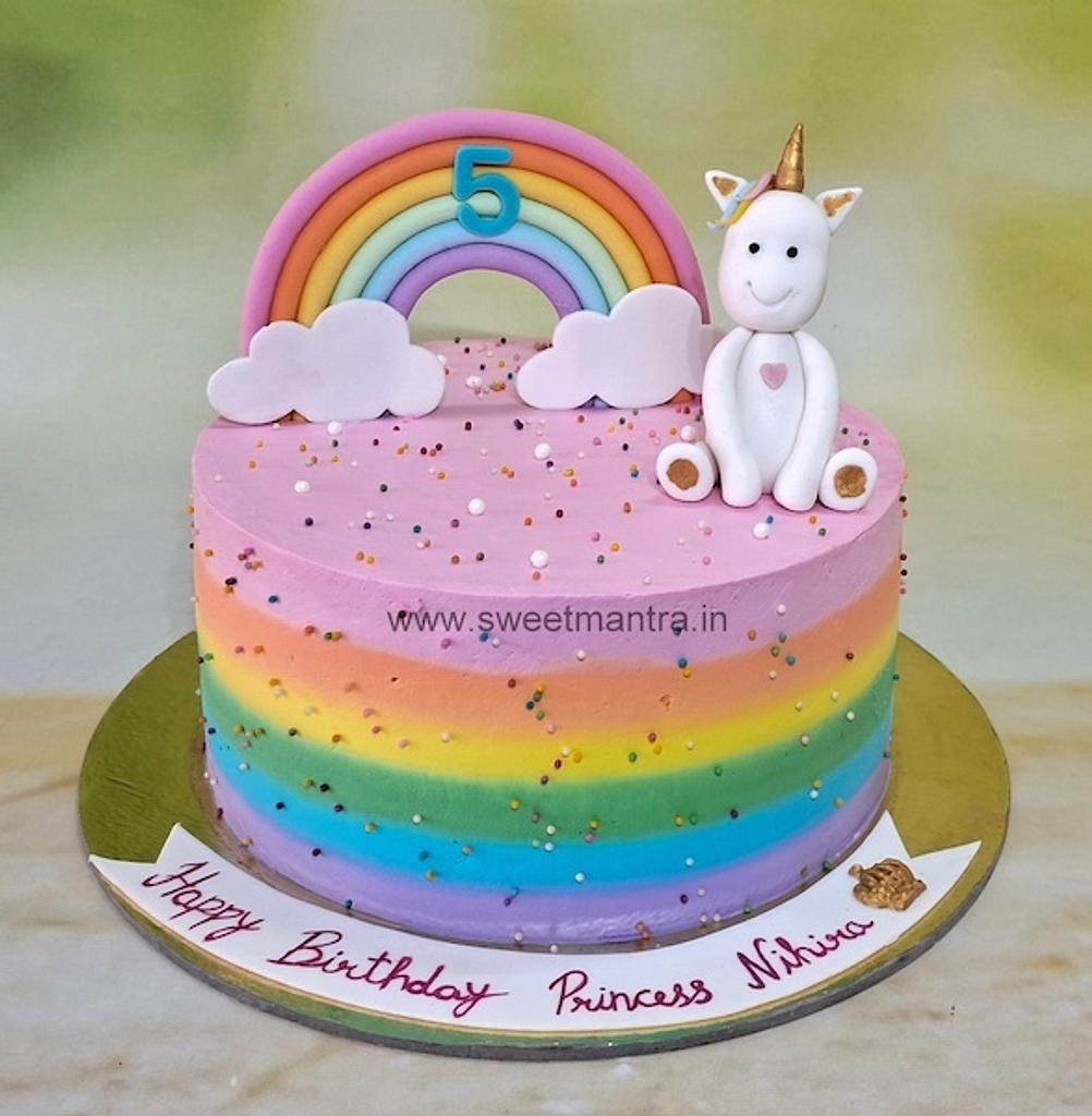 unicorn cake with whipped cream