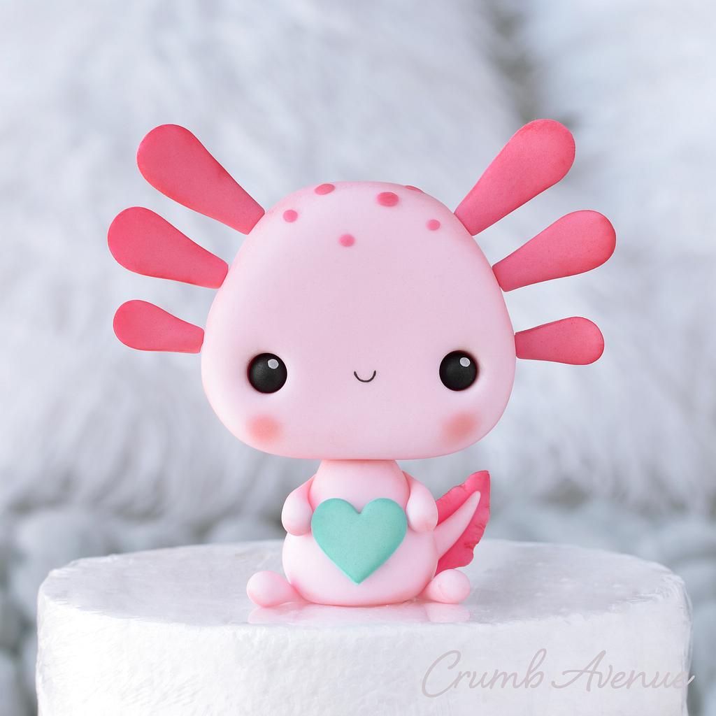 Cute pink happy axolotl cake topper