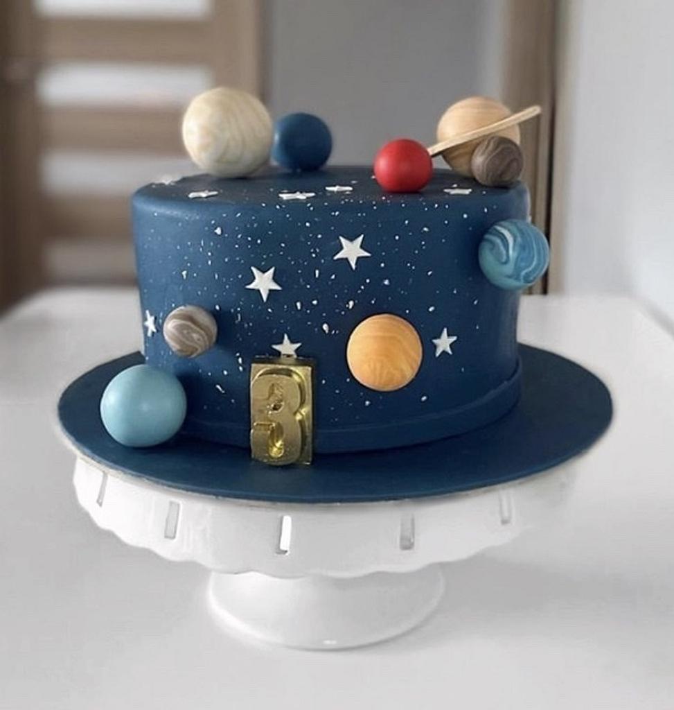 Planets birthday cake | Planet cake, Galaxy cake, Celebration cakes