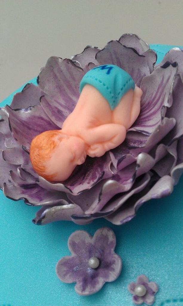 Baby asleep in a flower Cake Cake by The Rosehip Bakery CakesDecor