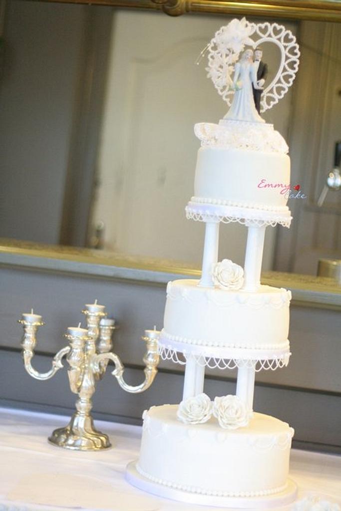 traditional wedding cake with pillars Cake by Emmy CakesDecor