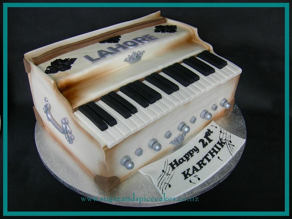 Birthday Cake Decorated With Fondant, Rounded, Symbolically Presenting  Piano And Cello Instruments. Stock Photo, Picture and Royalty Free Image.  Image 50905679.