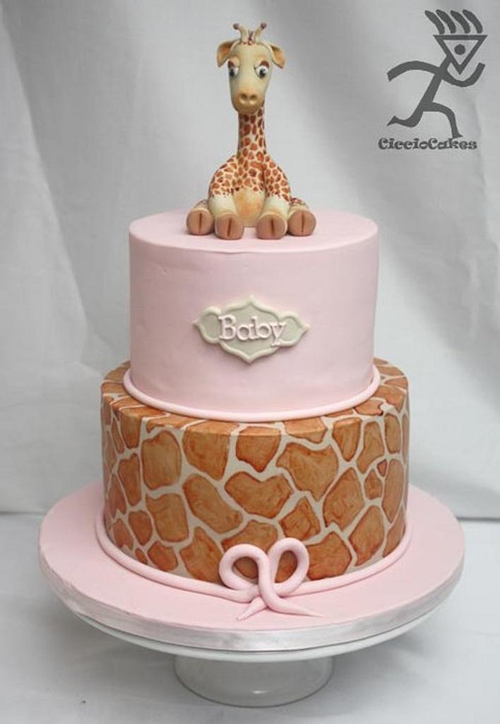 pink giraffe baby shower cake