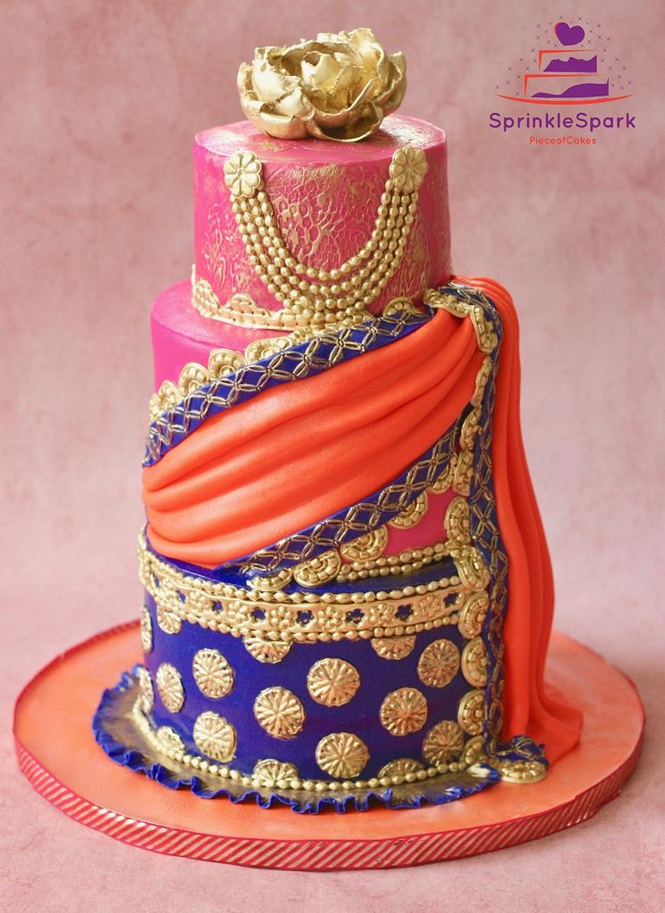 Traditional wear manifests in edible form with this Banarasi Saree-themed  cake