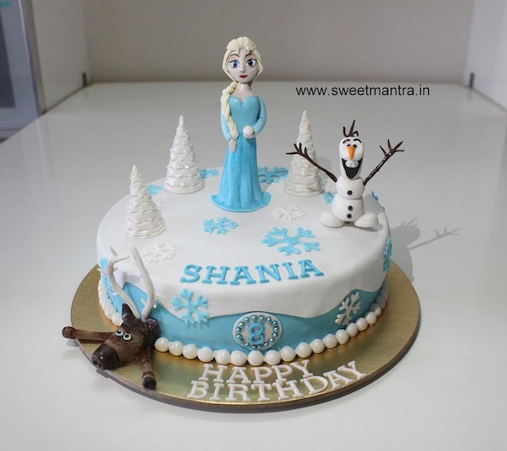 Frozen Elsa theme small fondant cake with 3D edible Elsa - CakesDecor