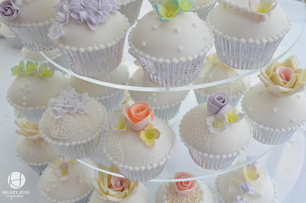 Pastels, flowers and lace Cupcake Tower - Cake by Hilary - CakesDecor
