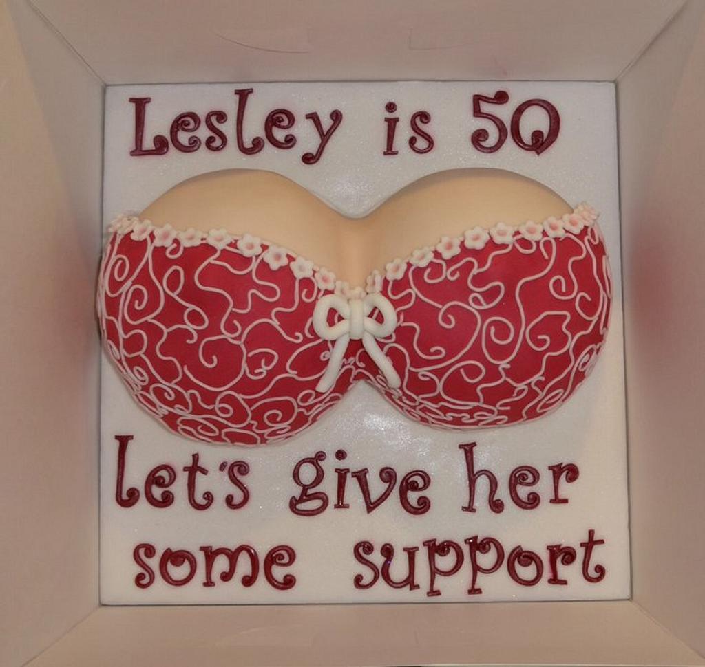 Leopard print sexy bra 50th birthday cake with pink base cake and hearts |  arteatsbakery