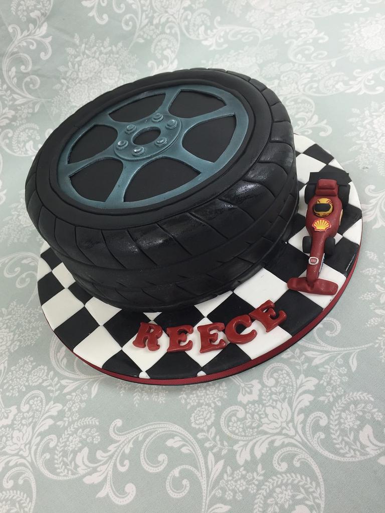 tyre theme birthday cake by bakisto motorbike tyre cake