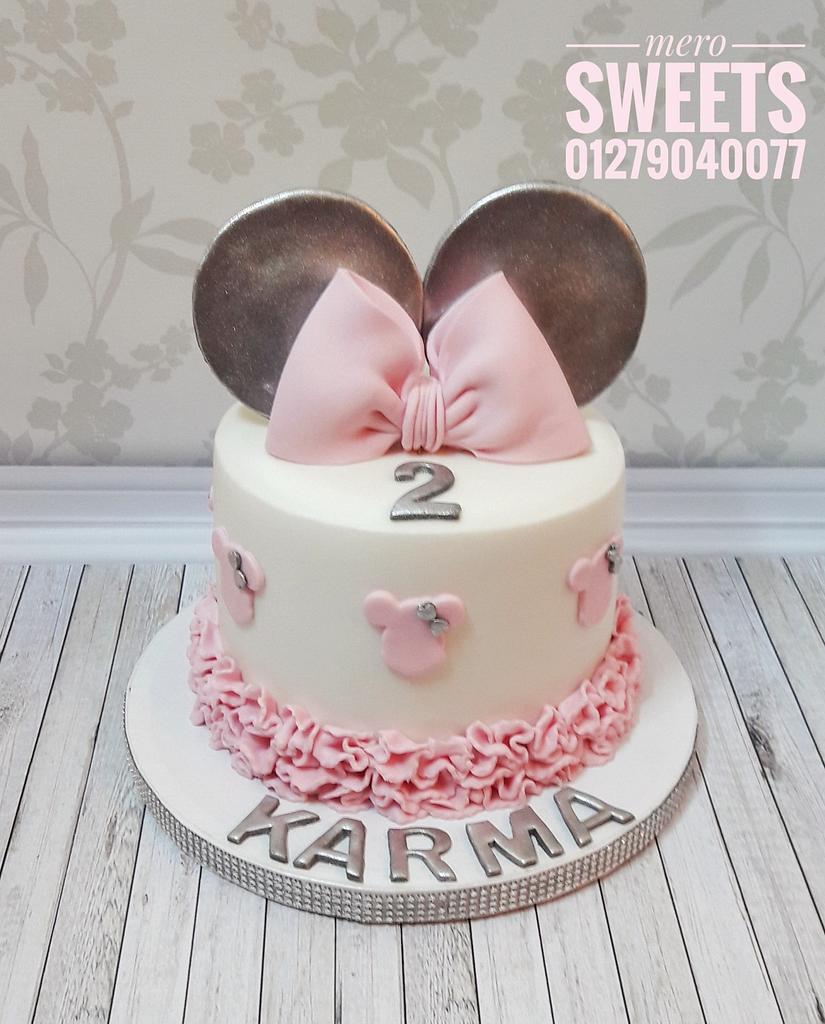 Pink Minnie mouse cake - Decorated Cake by Meroosweets - CakesDecor