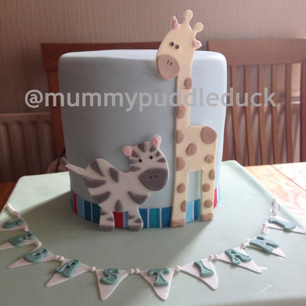 Giraffe with a Birthday Cake