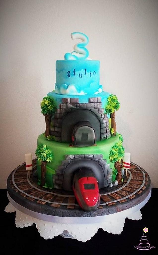 And yes its a cake....tunnel cake....train going in tunnel cake.....so  happy with result...made this cake for my brothers son Arnav's 2nd  birthday....all... | By Whisk N Frost | Facebook
