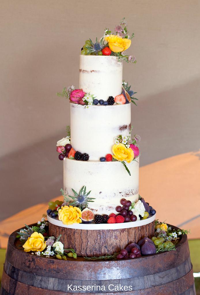 Semi Naked Wedding Cake With Fresh Fruit And Flowers Cakesdecor 