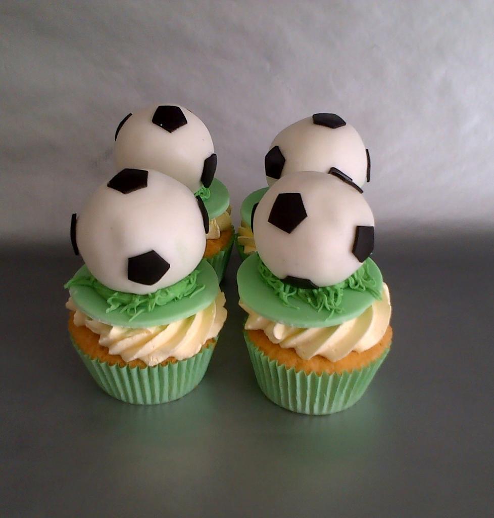 Sports themed cupcakes - Cake by Essentially Cakes - CakesDecor