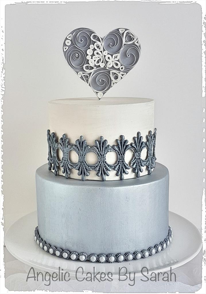 White Wedding Cake with Silver, Black and Pearl Jewels acc… | Flickr