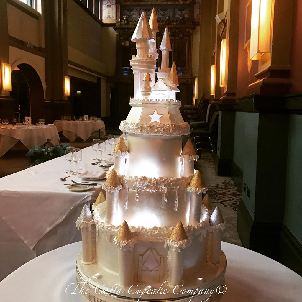 Large White Wedding Cake with Castle Shaped Towers Stock Photo - Image of  dessert, shaped: 147515612