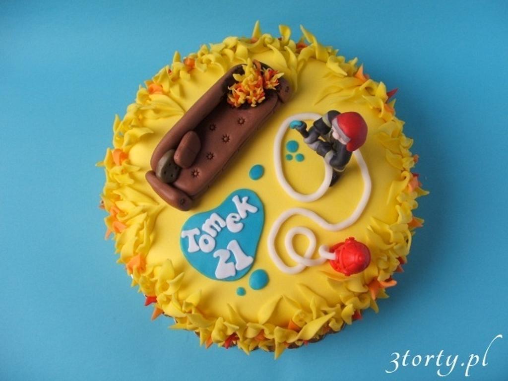 Firefighter and burning couch Cake by 3torty CakesDecor