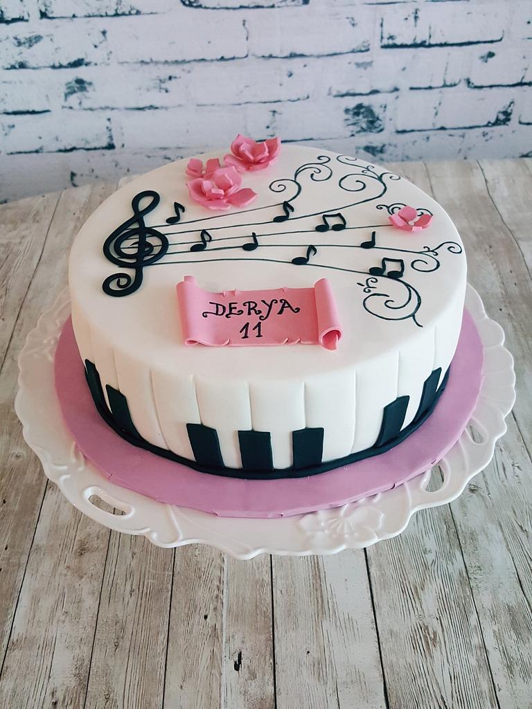 My grandson Lawrence is autistic but he loves pianos and can hold a tune! I  made him a piano cake for his 8th birthday! : r/Cakes
