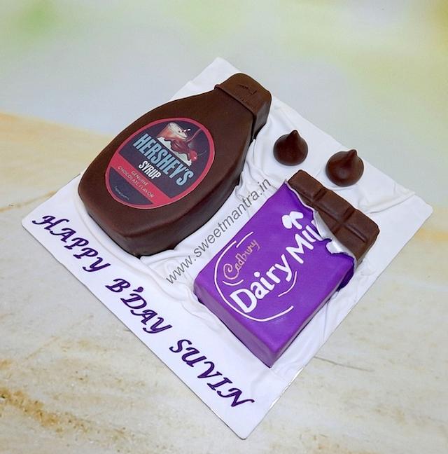 Dairy Milk cake Decorated Cake by Sweet Mantra CakesDecor