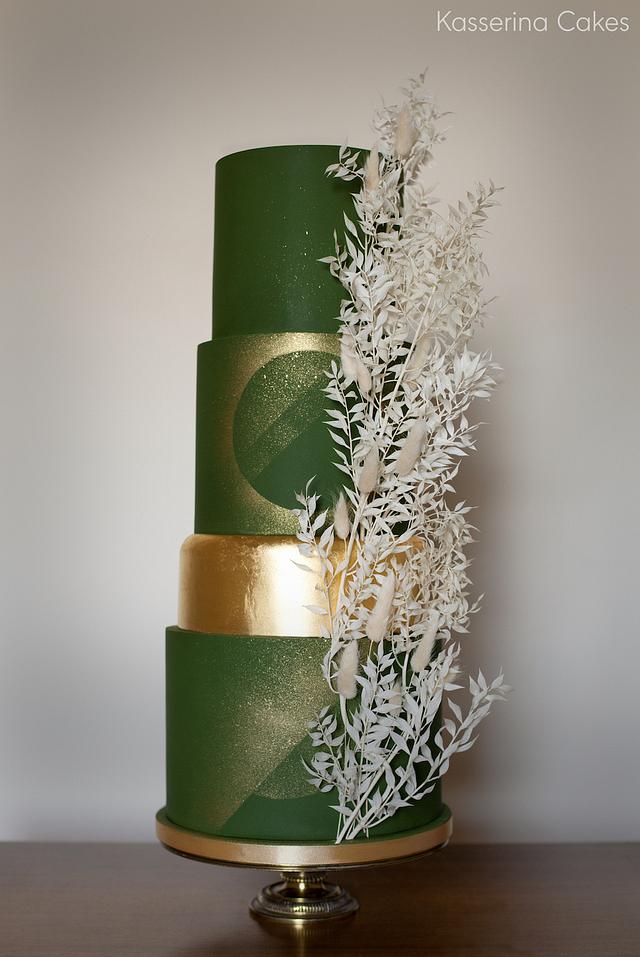 Green and gold geometric wedding cake with dried foliage - CakesDecor