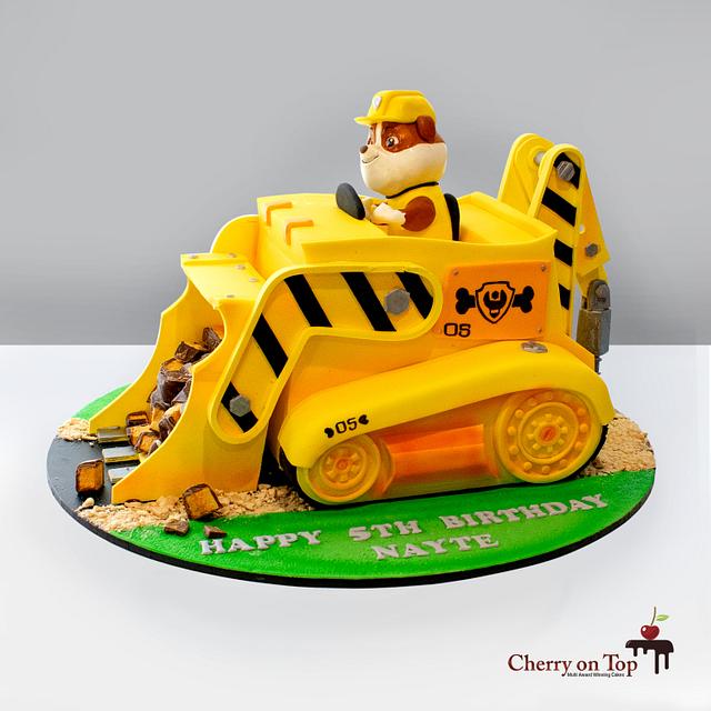 Rubble's dozer cake - Decorated Cake by Cherry on Top - CakesDecor