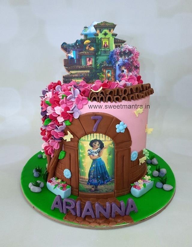 Encanto Mirabel cake - Decorated Cake by Sweet Mantra - CakesDecor