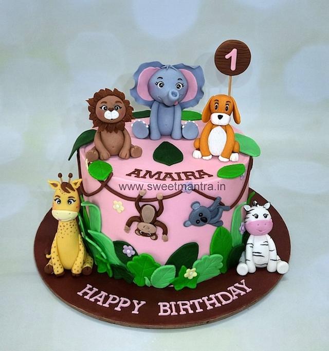 Jungle cake in pink - Decorated Cake by Sweet Mantra - CakesDecor