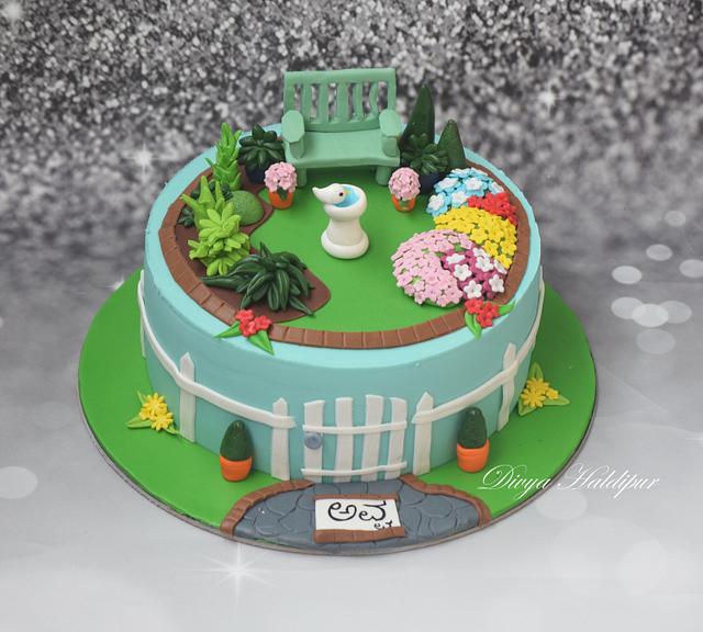 Garden theme cake Decorated Cake by Divya Haldipur CakesDecor