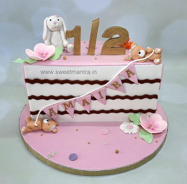 6 months cake for baby girl Decorated Cake by Sweet CakesDecor