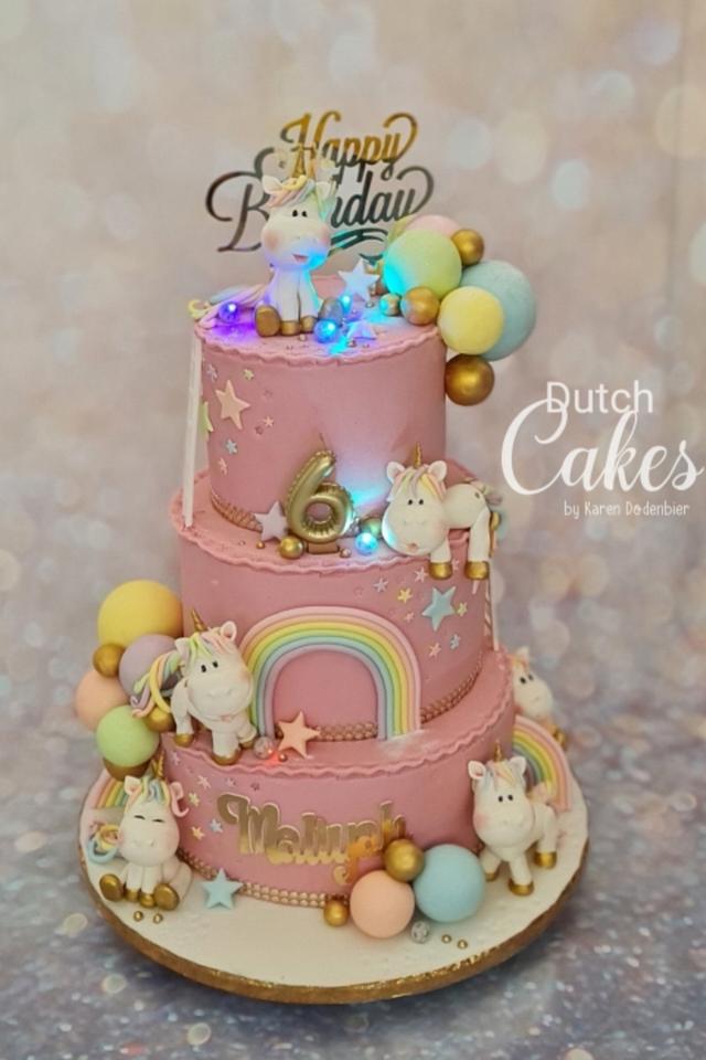 Pink Unicorn cake with twinkle lights Decorated Cake by CakesDecor