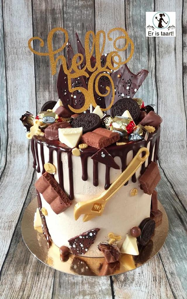 Drip cake Cake by Wilma Olivier CakesDecor