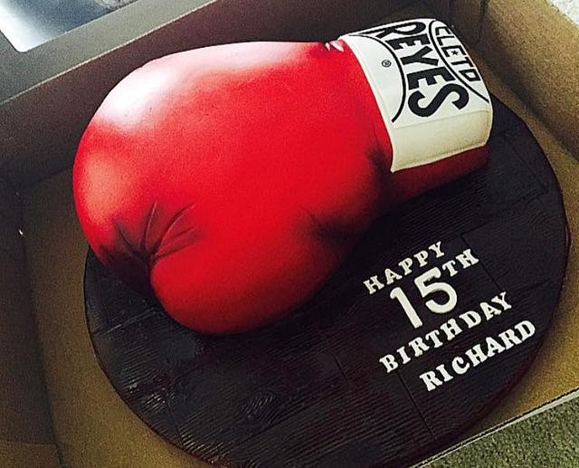 Boxing Gloves Decorated Cake by CakesDecor