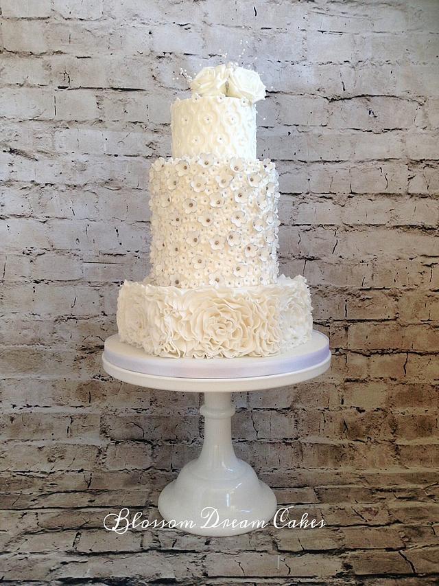 Ruffles & Roses white wedding cake