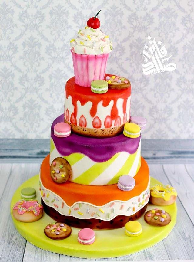 Sweet treats cake Decorated Cake by Faten_salah CakesDecor