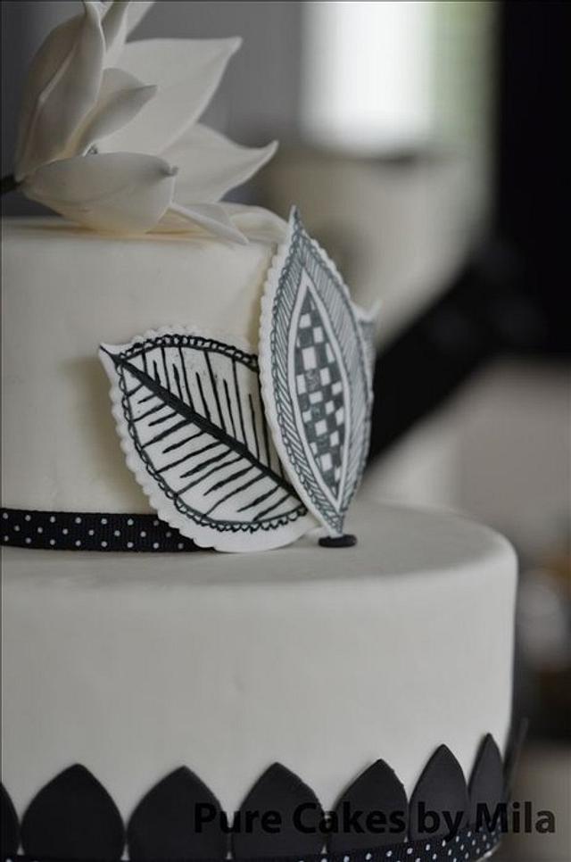 Black and White Cake with Lotus and Mehndi design Leaves