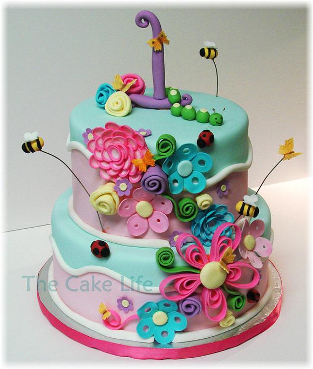 flower and bug 1st birthday cake