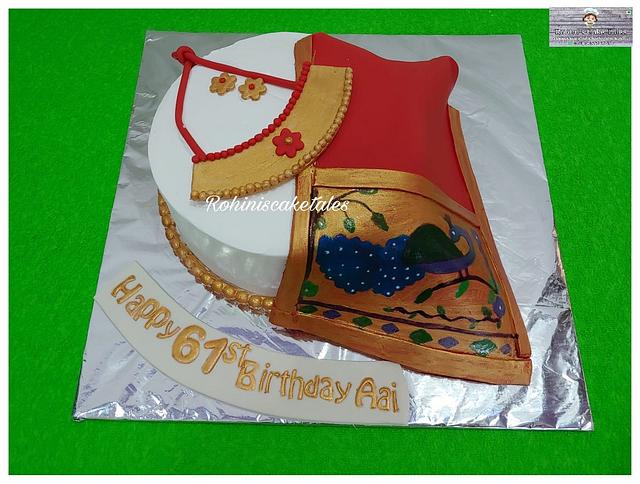 Paithani cake with kolhapuri saaj and earrings! . . #cakestagram #cakeboss  #cakesofinstagram #paithanicake #paithani #maharashtra #saree… | Instagram