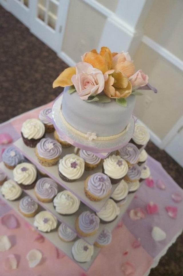 Flower cupcake tower - Decorated Cake by KAT - CakesDecor