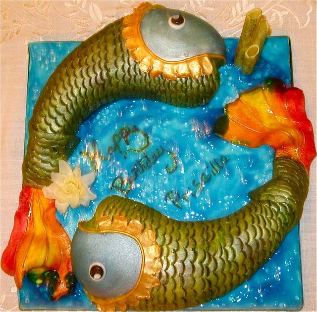 Pisces cake Decorated Cake by Daisy Brydon Creations CakesDecor