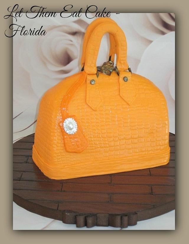 Louis Vuitton handbag cake - Decorated Cake by Claire - CakesDecor