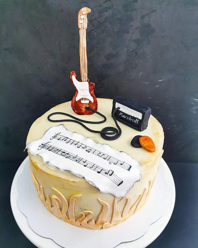 Guitar cake Decorated Cake by Frajla Jovana CakesDecor