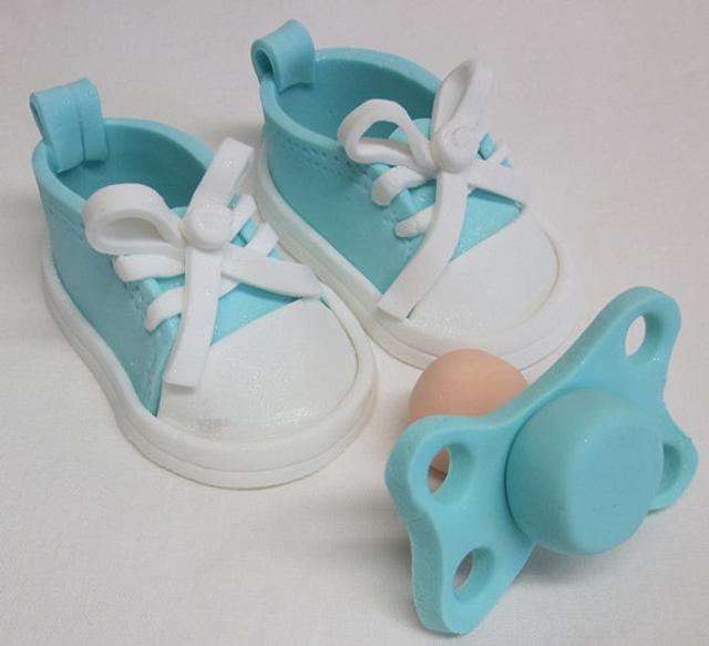 Gumpaste baby booties and pacifier Decorated Cake by CakesDecor
