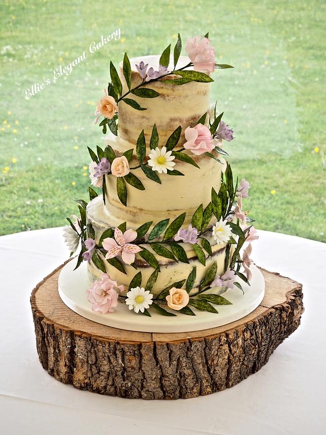 Floral Garland wedding cake - Decorated Cake by Ellie @ - CakesDecor