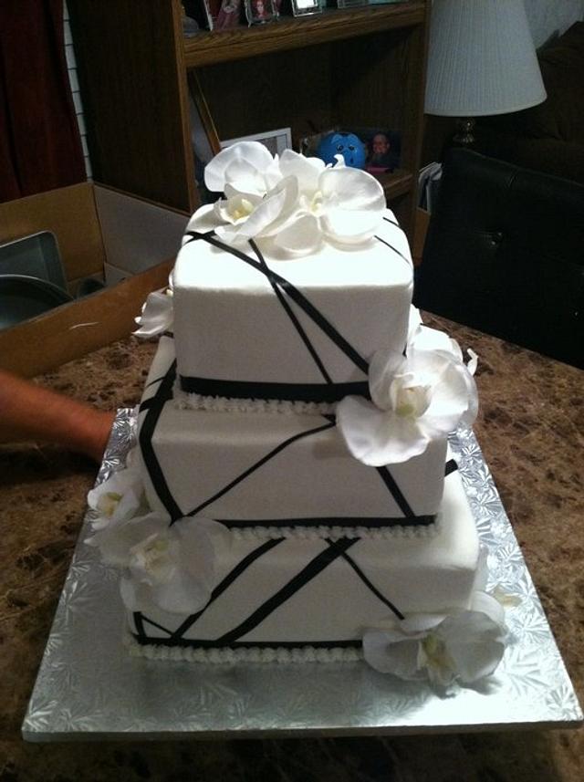 Ribbon with Orchids Wedding Cake